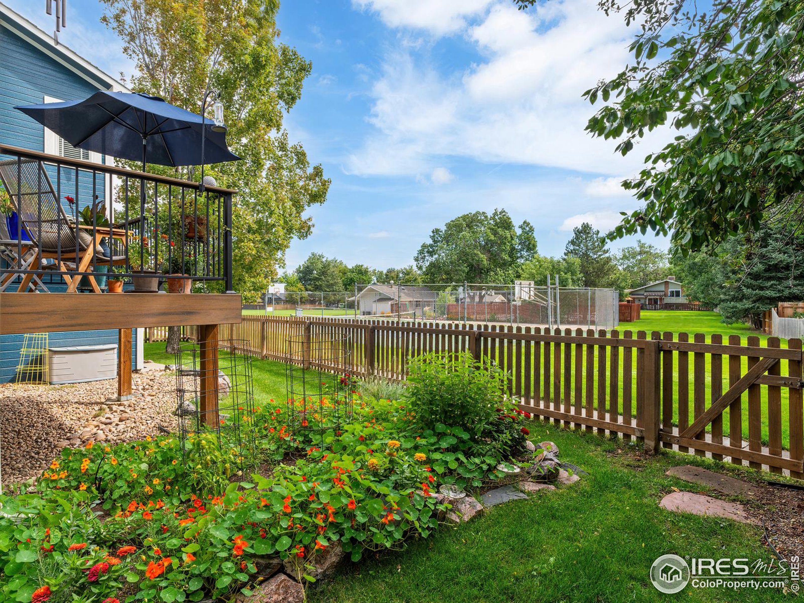 234 Mohawk Drive Boulder, CO 80303 - Photo 37 of 49 a view of a chair and tables in the garden