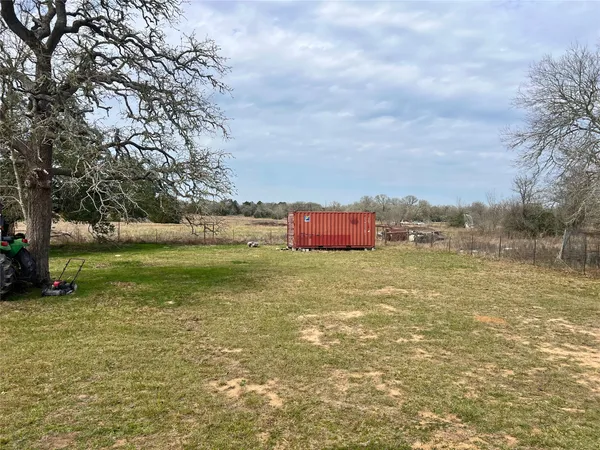 a view of outdoor space and yard