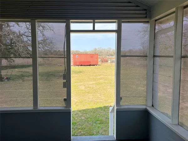 a view of a glass door with a from window