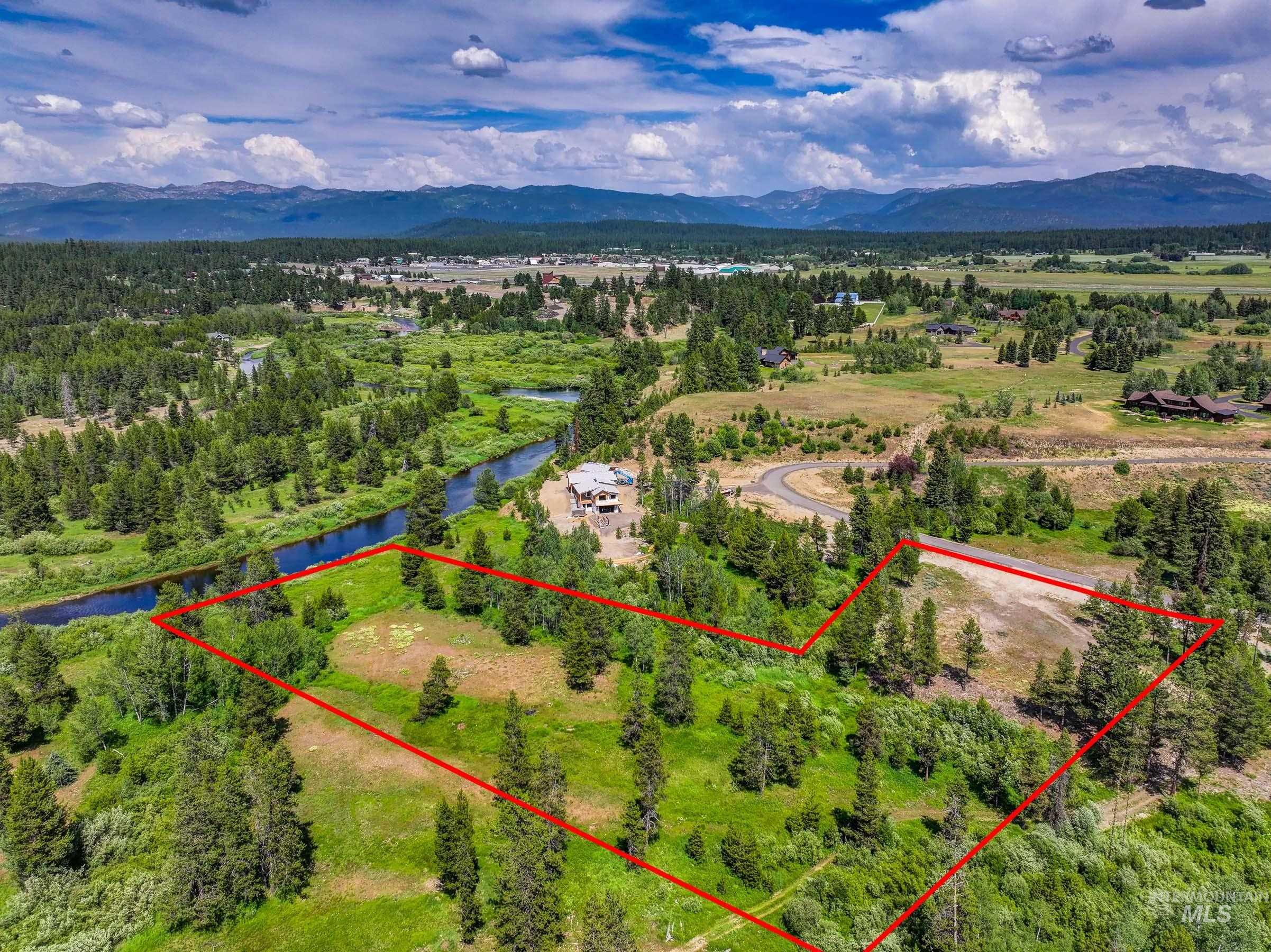 Lot 60 River Ranch McCall, ID 83638 - Photo 1 of 20 Aerial view of property's location featuring property parcel outlined and a water and mountain view