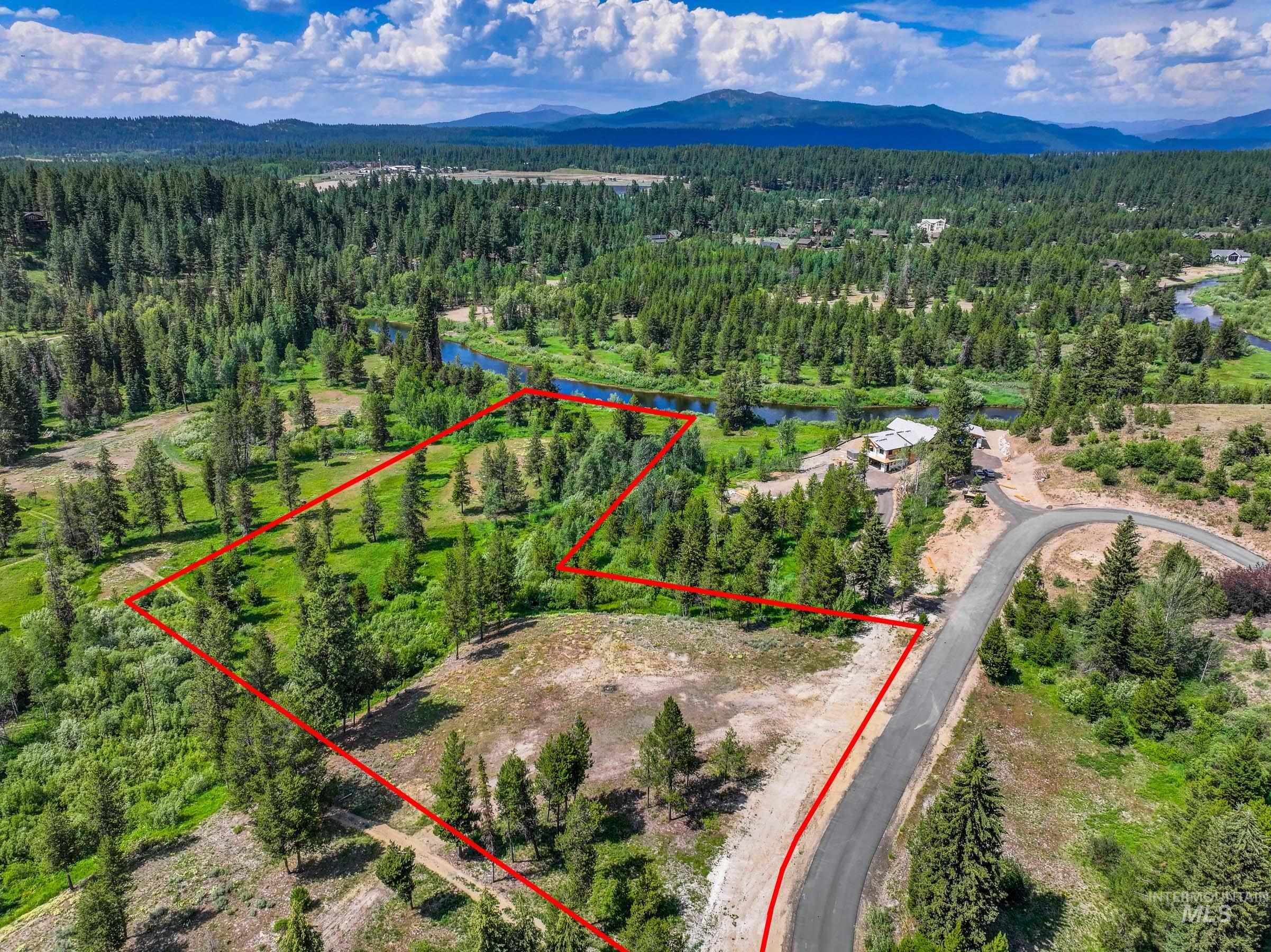 Lot 60 River Ranch McCall, ID 83638 - Photo 14 of 20 Aerial view of property and surrounding area with property boundaries highlighted and a water and mountain view