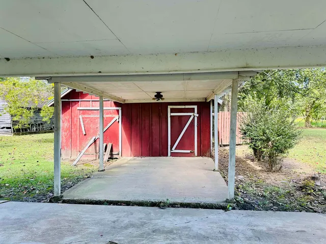 a view of a golf course with a trees