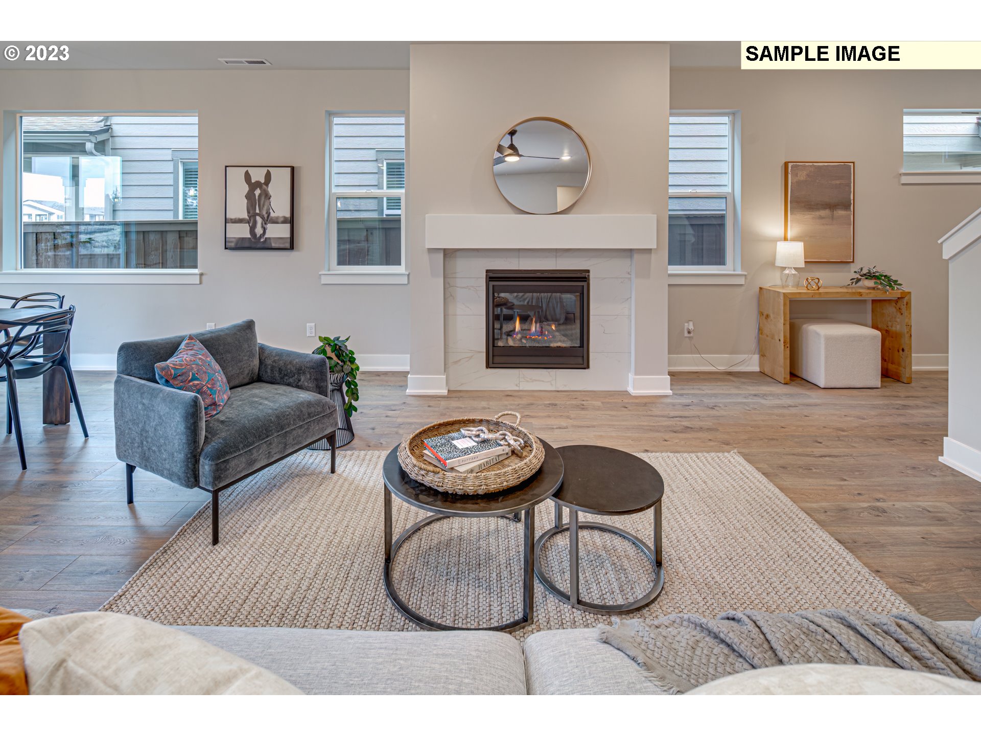 3624 South Arwana Lane Ridgefield, WA 98642 - Photo 5 of 8 a living room with furniture and a fireplace
