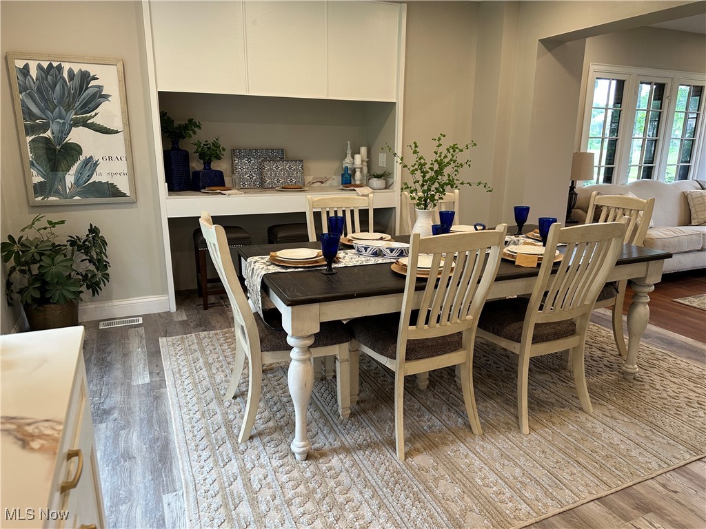 13707 Drexmore Road Cleveland, OH 44120 - Photo 5 of 35 Dining area with wood finished floors and baseboards