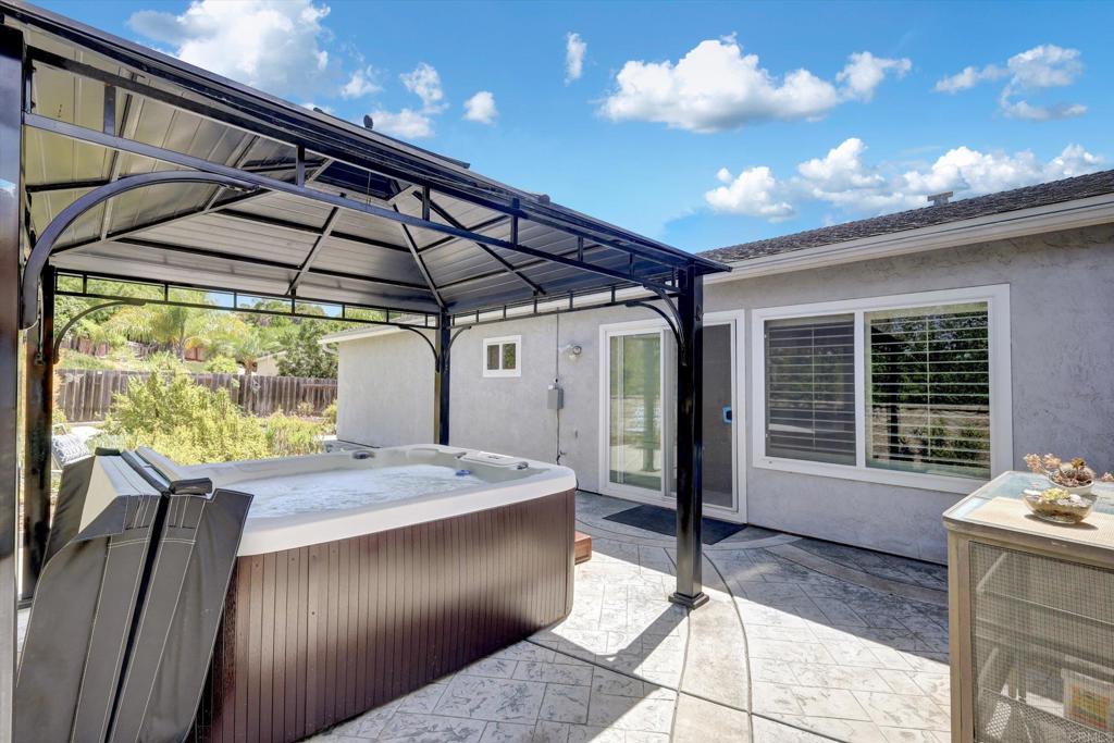 108 Blue Ash Court Encinitas, CA 92024 - Photo 22 of 35 a view of a porch with furniture and a yard