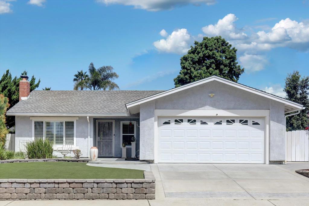 108 Blue Ash Court Encinitas, CA 92024 - Photo 35 of 35 a front view of a house with a yard and garage