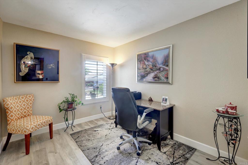 108 Blue Ash Court Encinitas, CA 92024 - Photo 10 of 35 a work room with furniture and wooden floor