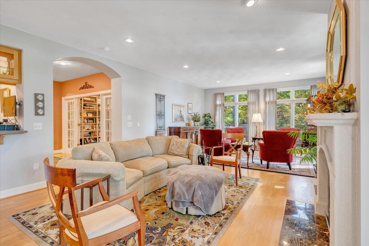 190 Tranquility Road Moneta, VA 24121 - Photo 16 of 170 a living room with furniture fireplace and a large window