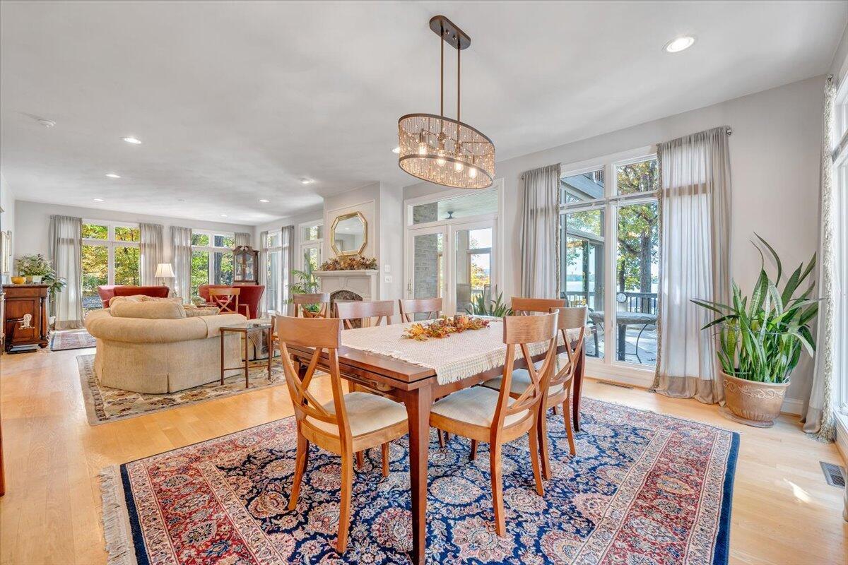 190 Tranquility Road Moneta, VA 24121 - Photo 32 of 170 a view of a dining room with furniture window and wooden floor