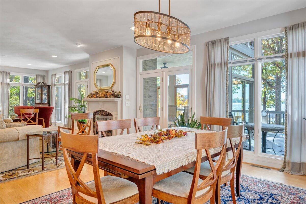 190 Tranquility Road Moneta, VA 24121 - Photo 33 of 170 a view of a dining room with furniture window and outside view