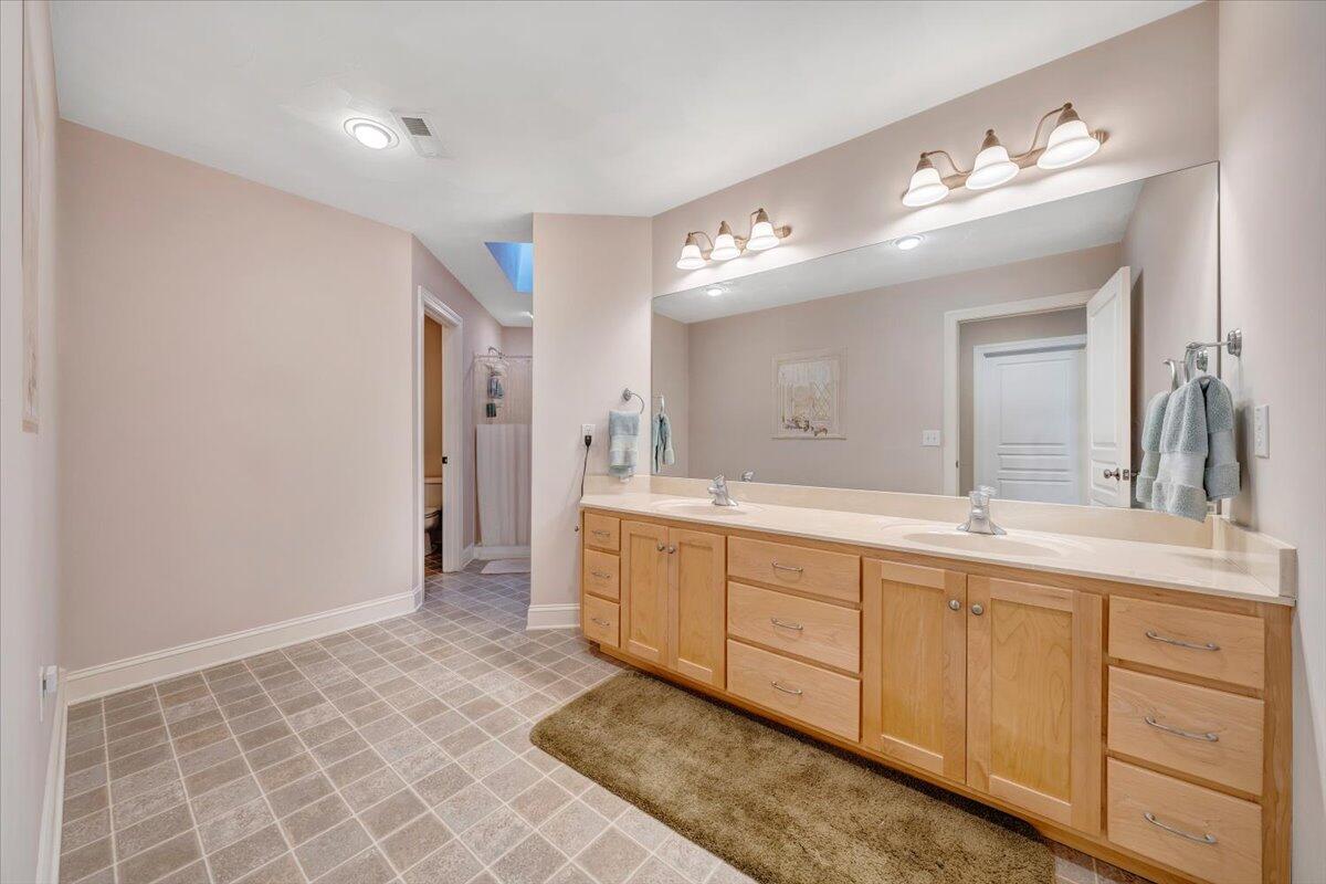190 Tranquility Road Moneta, VA 24121 - Photo 74 of 170 a spacious bathroom with a double vanity sink mirror and