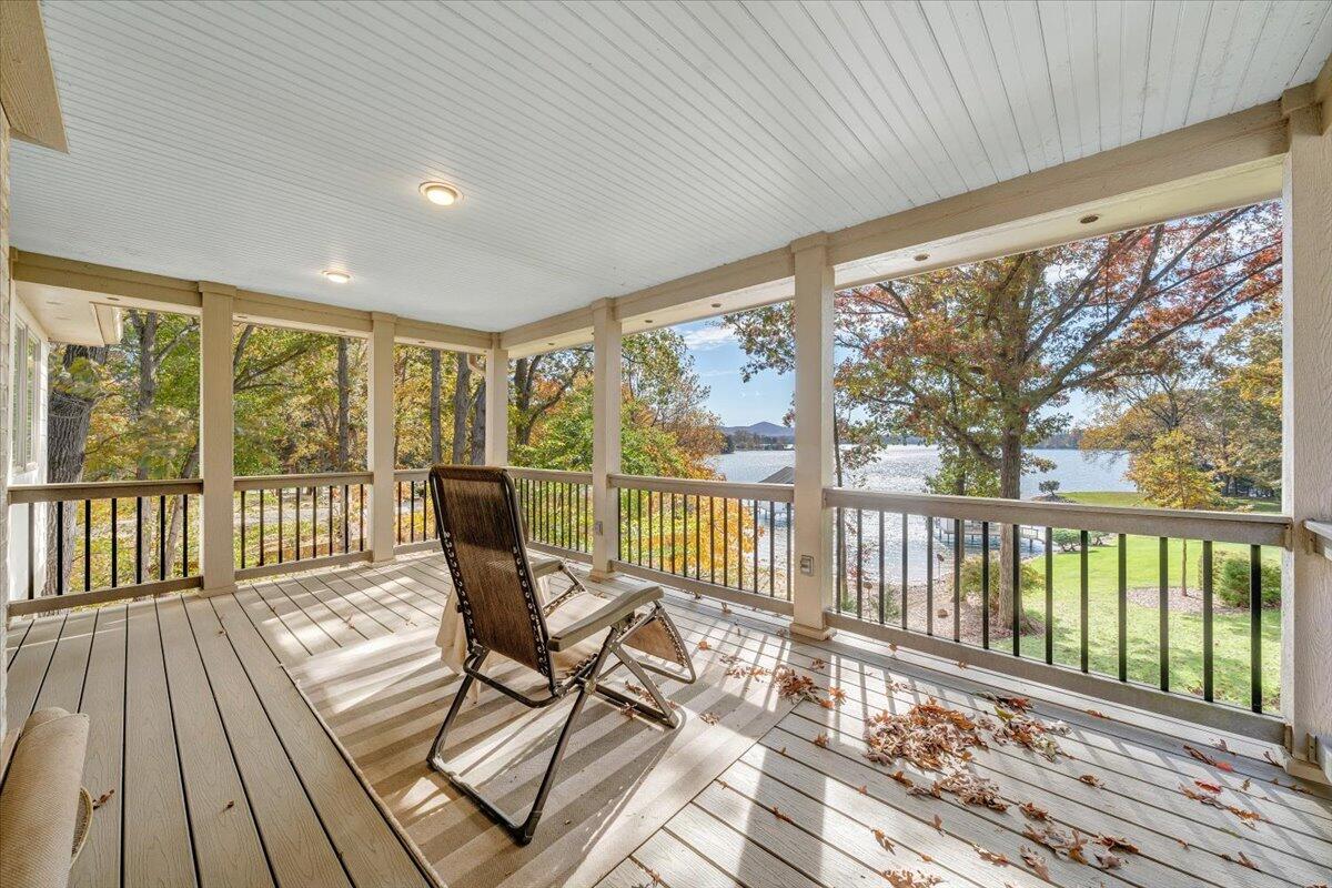 190 Tranquility Road Moneta, VA 24121 - Photo 77 of 170 a view of a two room with furniture and wooden floor
