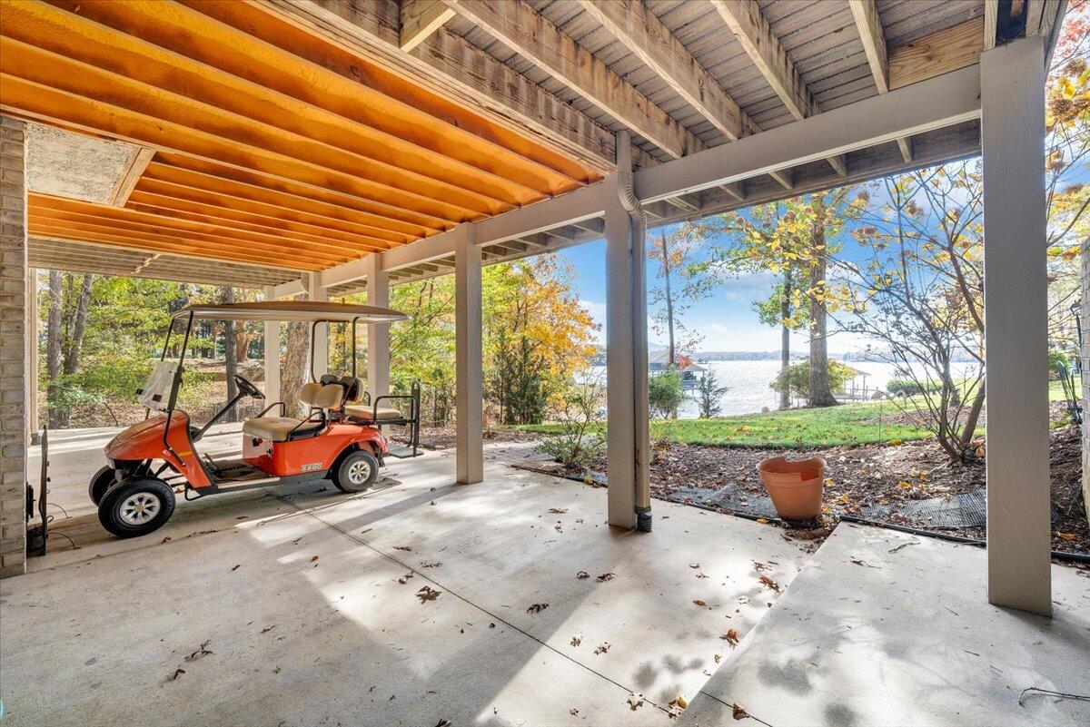 190 Tranquility Road Moneta, VA 24121 - Photo 95 of 170 a car parked in front of yellow house