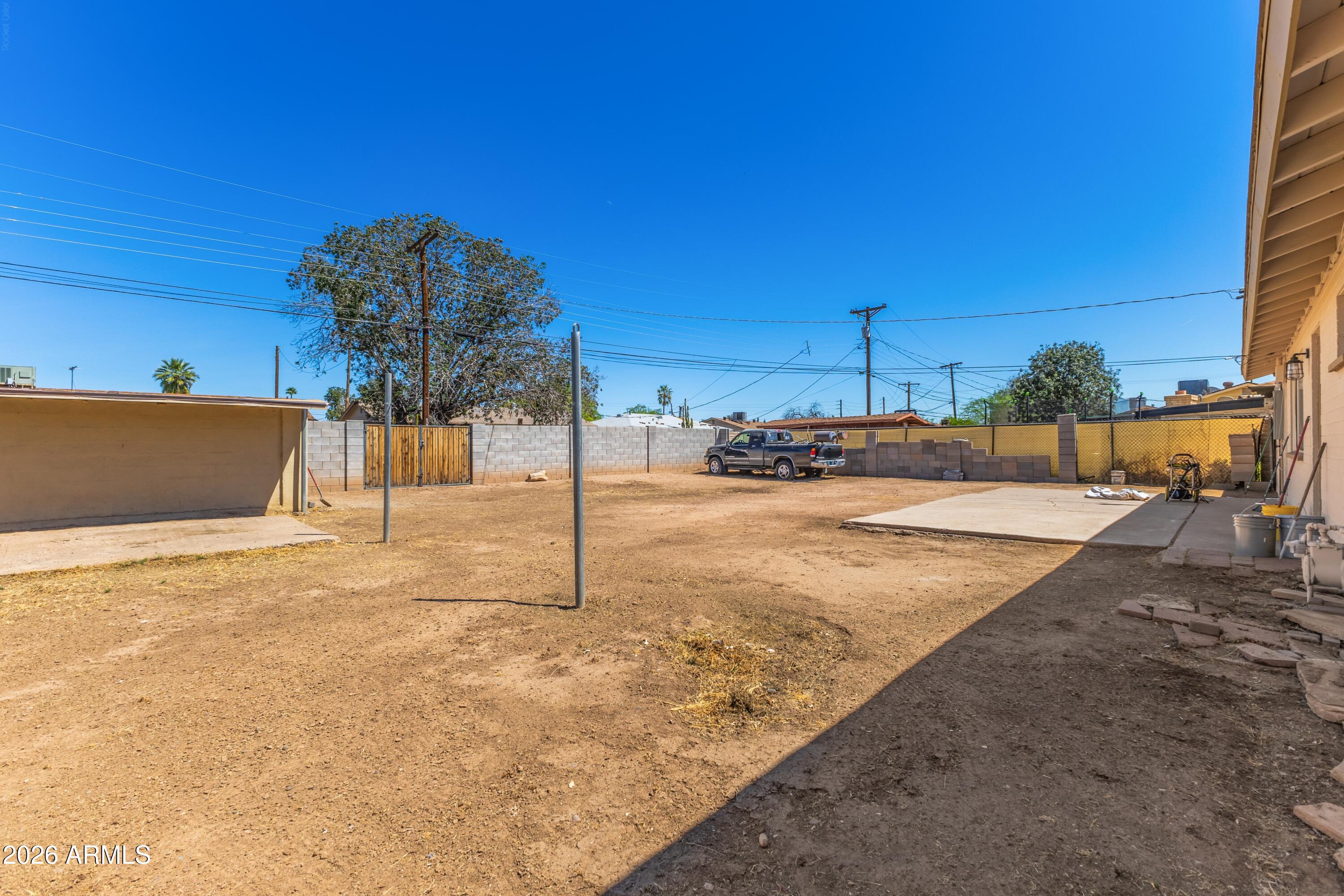 3137 North 37th Drive Phoenix, AZ 85019 - Photo 16 of 18 a view of a backyard