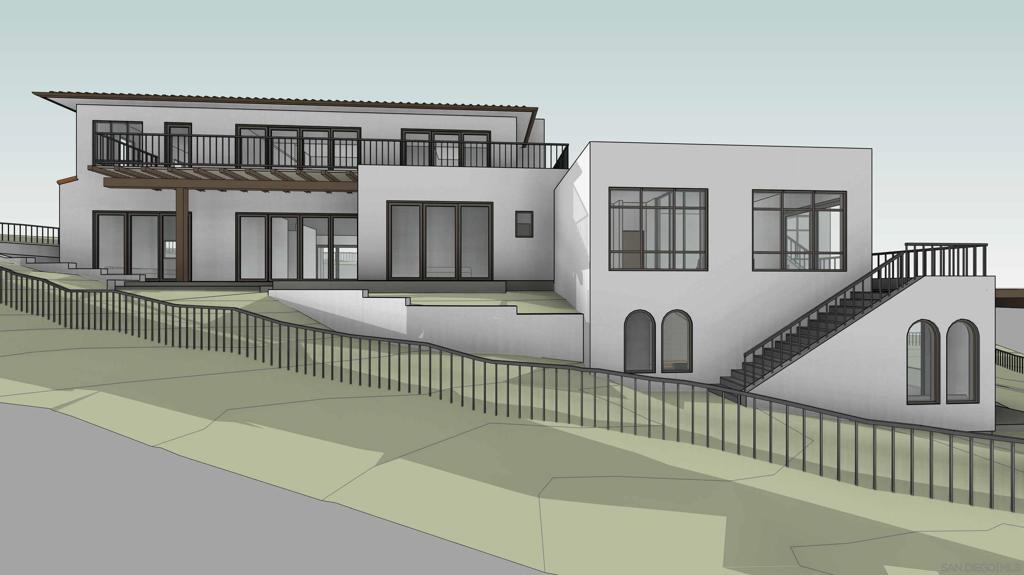 7687 Hillside Drive La Jolla, CA 92037 - Photo 10 of 16 a front view of a house with a wooden fence