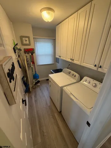 a storage room with washer and dryer