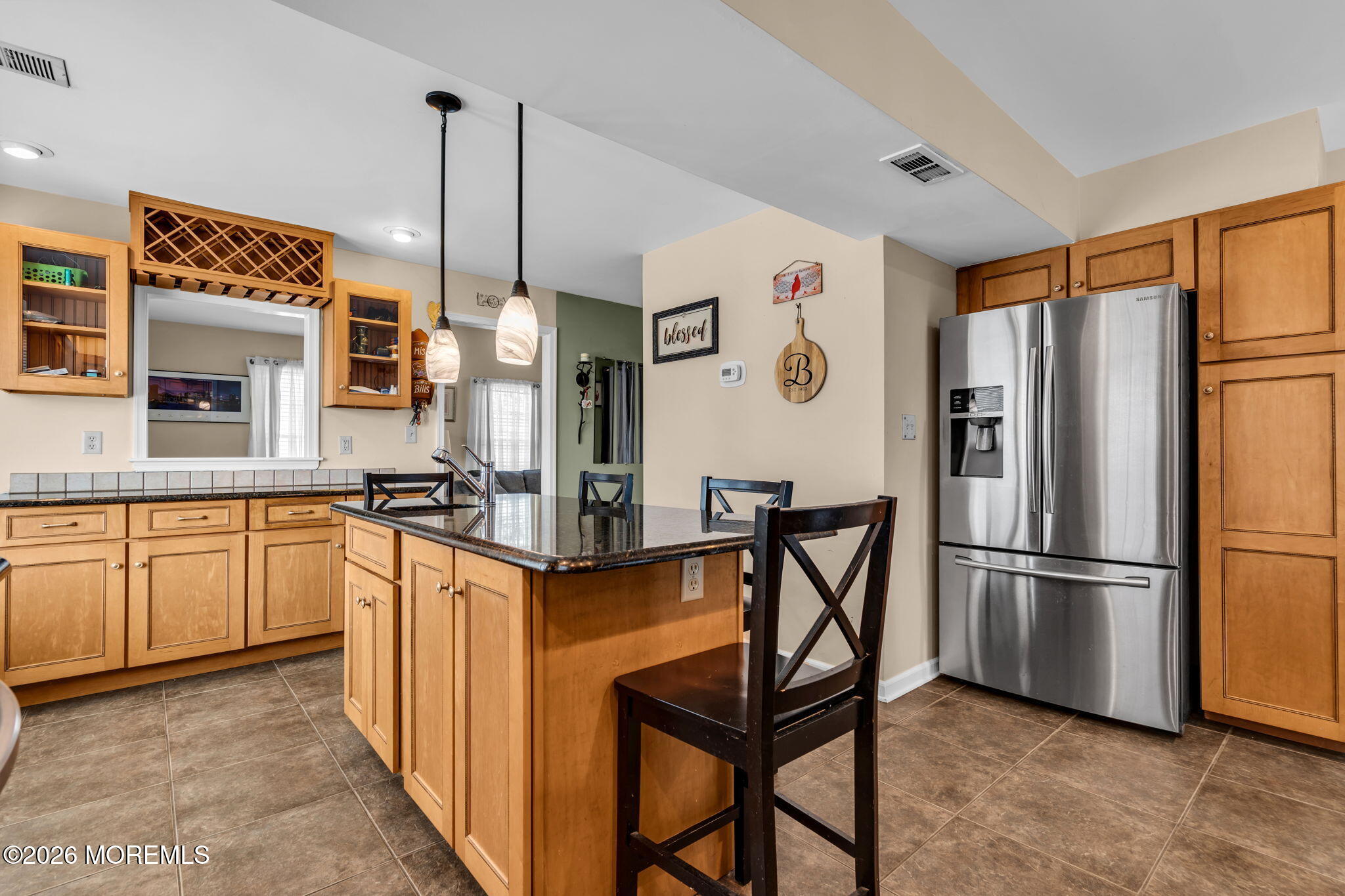41 Concord Circle Howell, NJ 07731 - Photo 17 of 36 a kitchen with stainless steel appliances granite countertop a refrigerator a sink and white cabinets