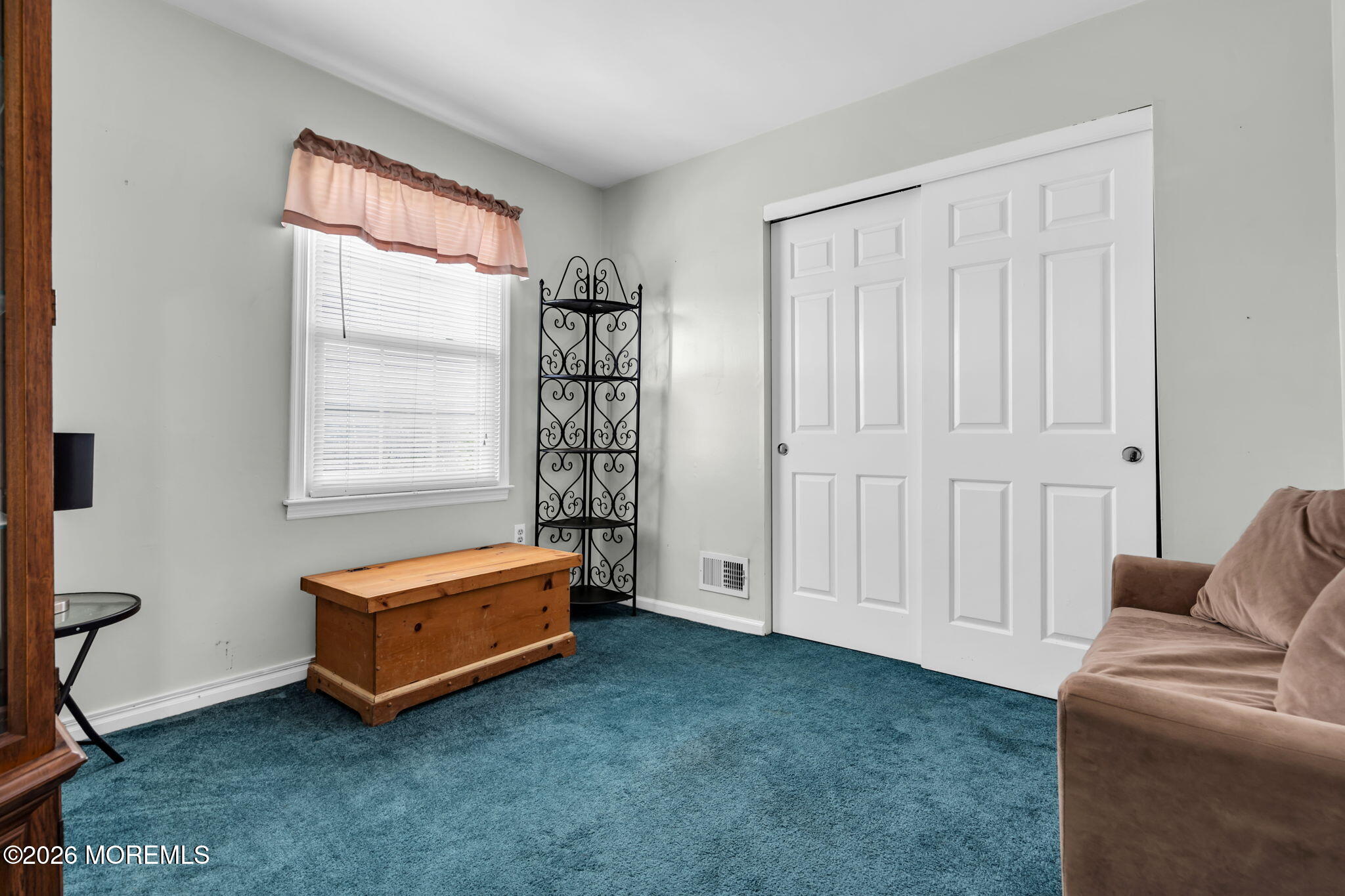 41 Concord Circle Howell, NJ 07731 - Photo 27 of 36 a living room with furniture and a window