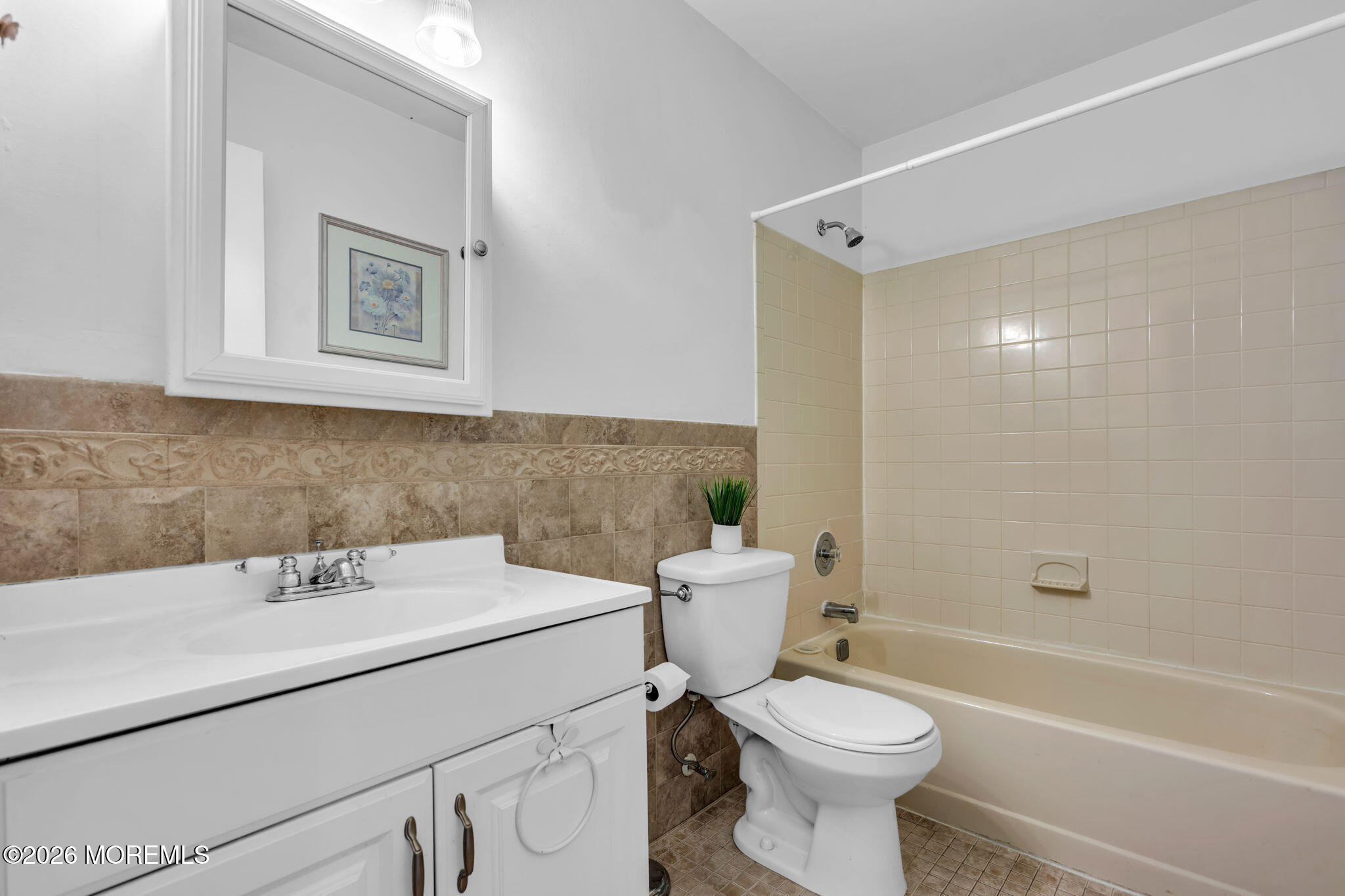 41 Concord Circle Howell, NJ 07731 - Photo 29 of 36 a bathroom with a sink a toilet and a bathtub