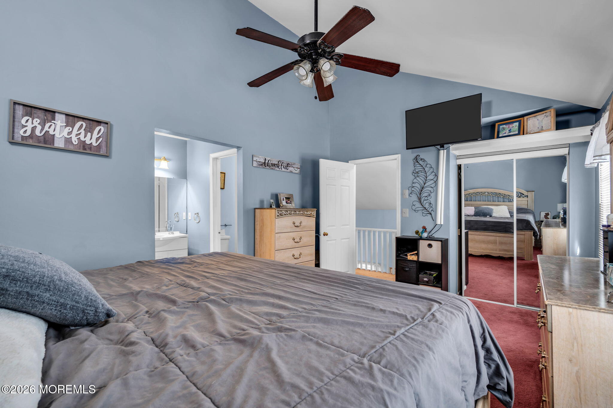 41 Concord Circle Howell, NJ 07731 - Photo 31 of 36 a bedroom with a bed and a chandelier