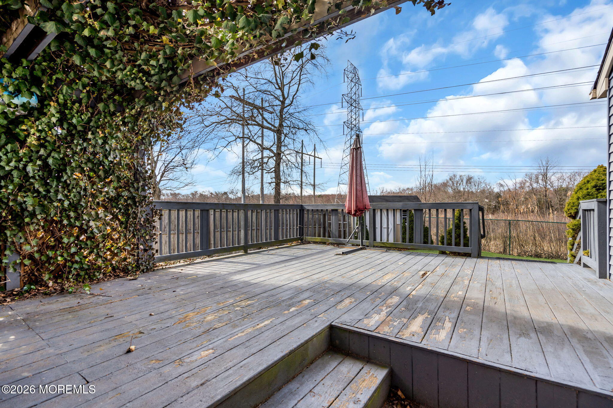 41 Concord Circle Howell, NJ 07731 - Photo 33 of 36 a view of wooden floor with a wooden fence