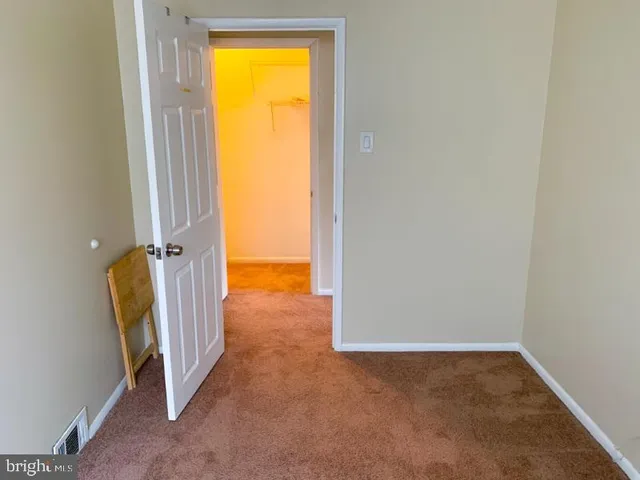 an empty room with a door