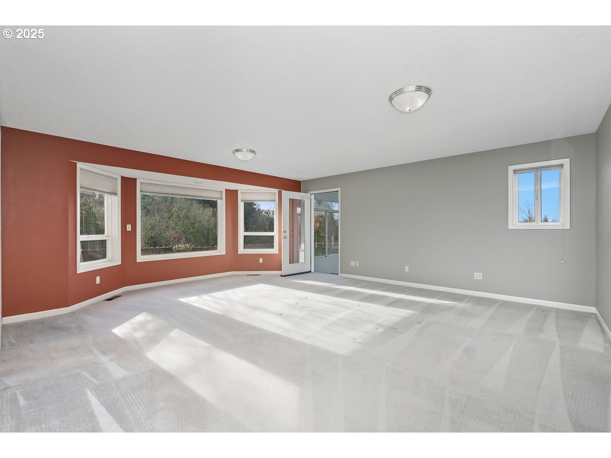 23990 Southwest Tile Flat Road Hillsboro, OR 97123 - Photo 11 of 46 a view of an empty room with a window
