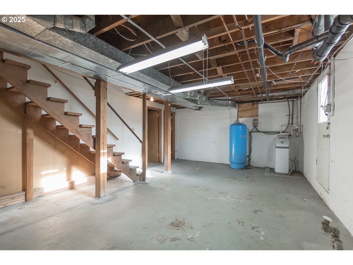 23990 Southwest Tile Flat Road Hillsboro, OR 97123 - Photo 23 of 46 a view of an empty room with wooden roof
