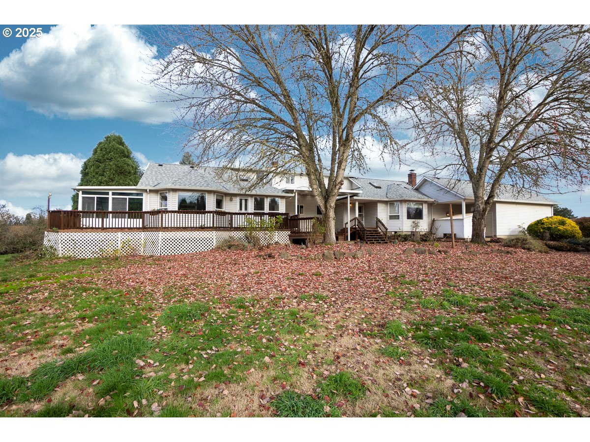 23990 Southwest Tile Flat Road Hillsboro, OR 97123 - Photo 26 of 46 a view of a house with a yard and sitting area