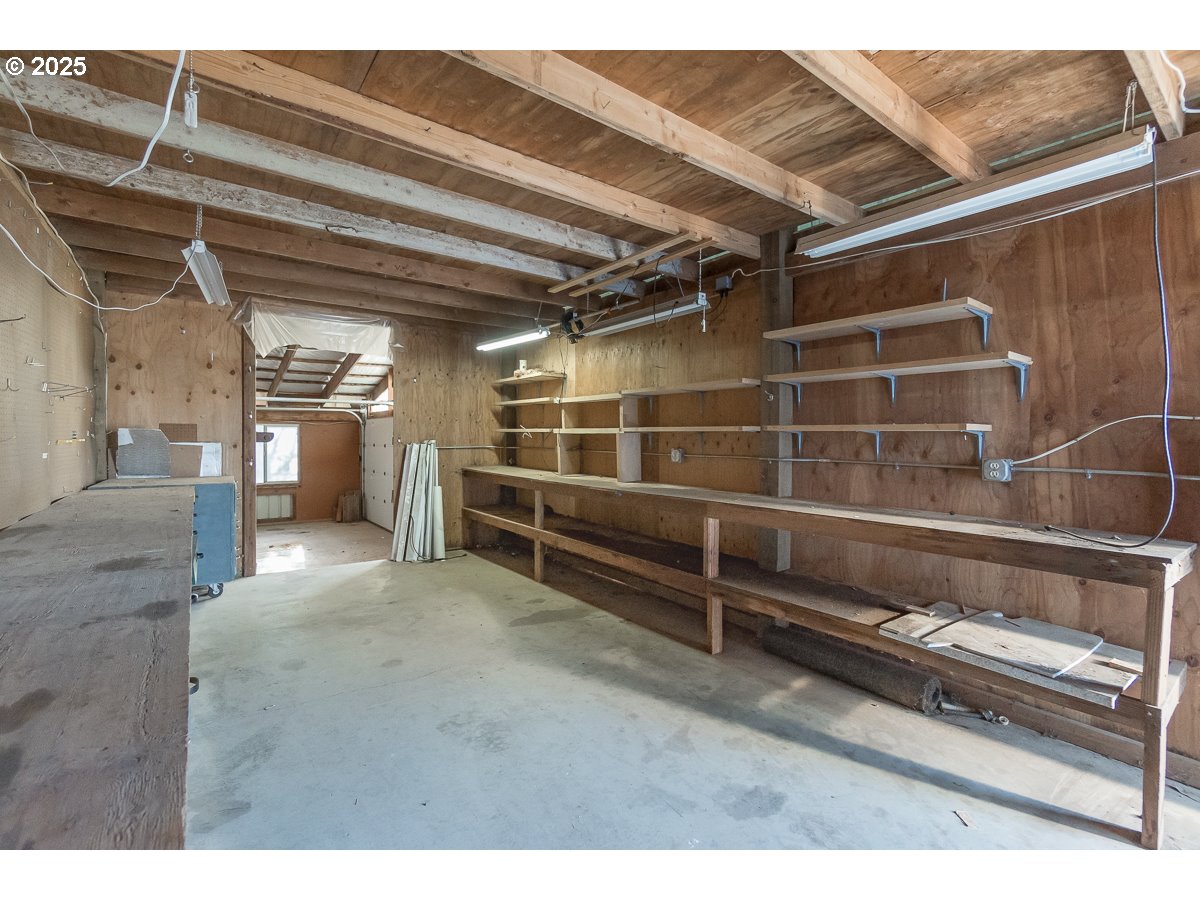 23990 Southwest Tile Flat Road Hillsboro, OR 97123 - Photo 35 of 46 a view of an empty room with racks on the wall