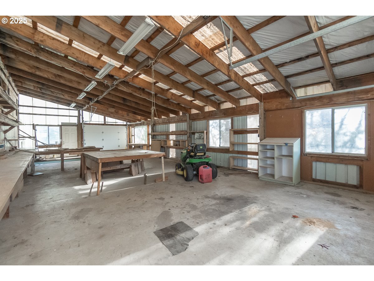 23990 Southwest Tile Flat Road Hillsboro, OR 97123 - Photo 36 of 46 a view of a garage with furniture