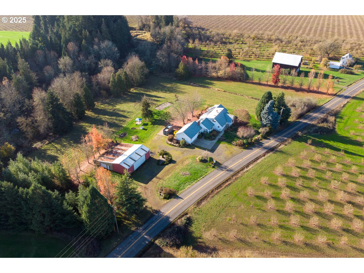 23990 Southwest Tile Flat Road Hillsboro, OR 97123 - Photo 42 of 46 a aerial view of a house with a swimming pool