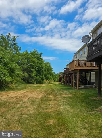 a view of a street with a building in the background