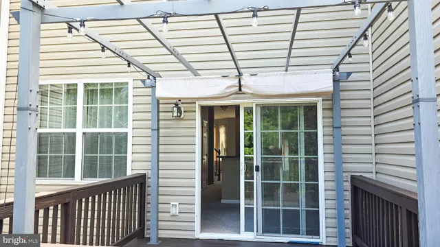 a kitchen with stainless steel appliances a refrigerator and a stove