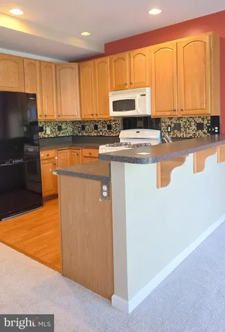 a view of an empty room with windows