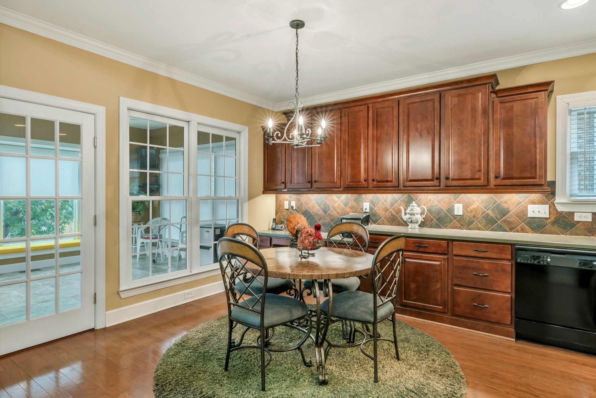 113 Cornerstone Circle Franklin, TN 37064 - Photo 16 of 58 a view of a dining room with furniture window and wooden floor