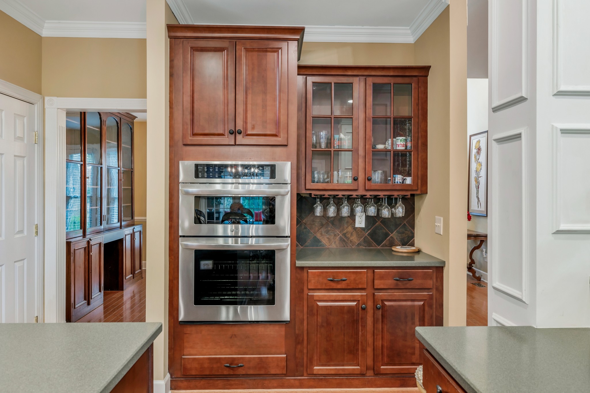113 Cornerstone Circle Franklin, TN 37064 - Photo 19 of 58 a kitchen with stainless steel appliances granite countertop a refrigerator and a stove