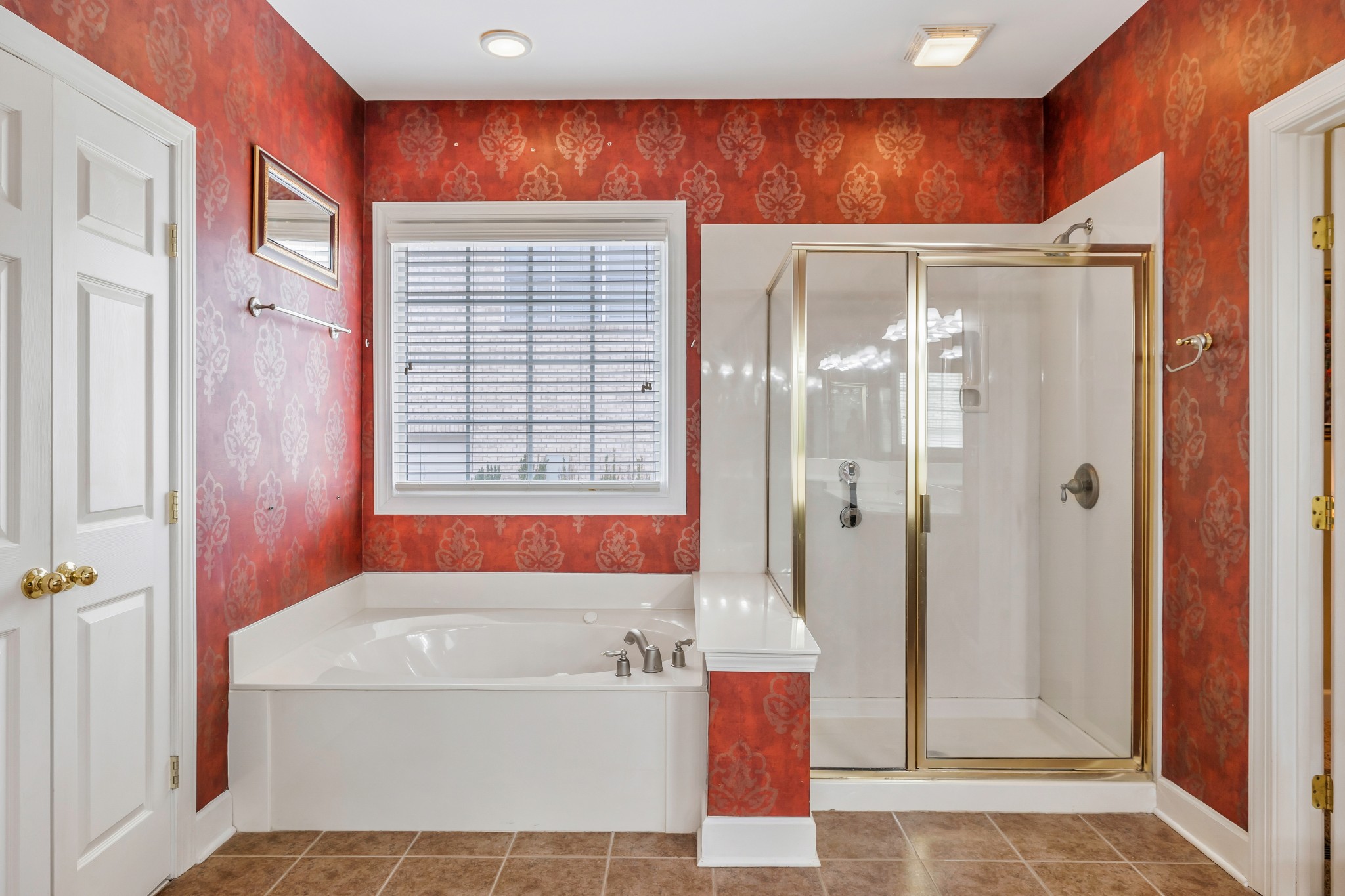 113 Cornerstone Circle Franklin, TN 37064 - Photo 23 of 58 a bathroom with a bathtub and a shower