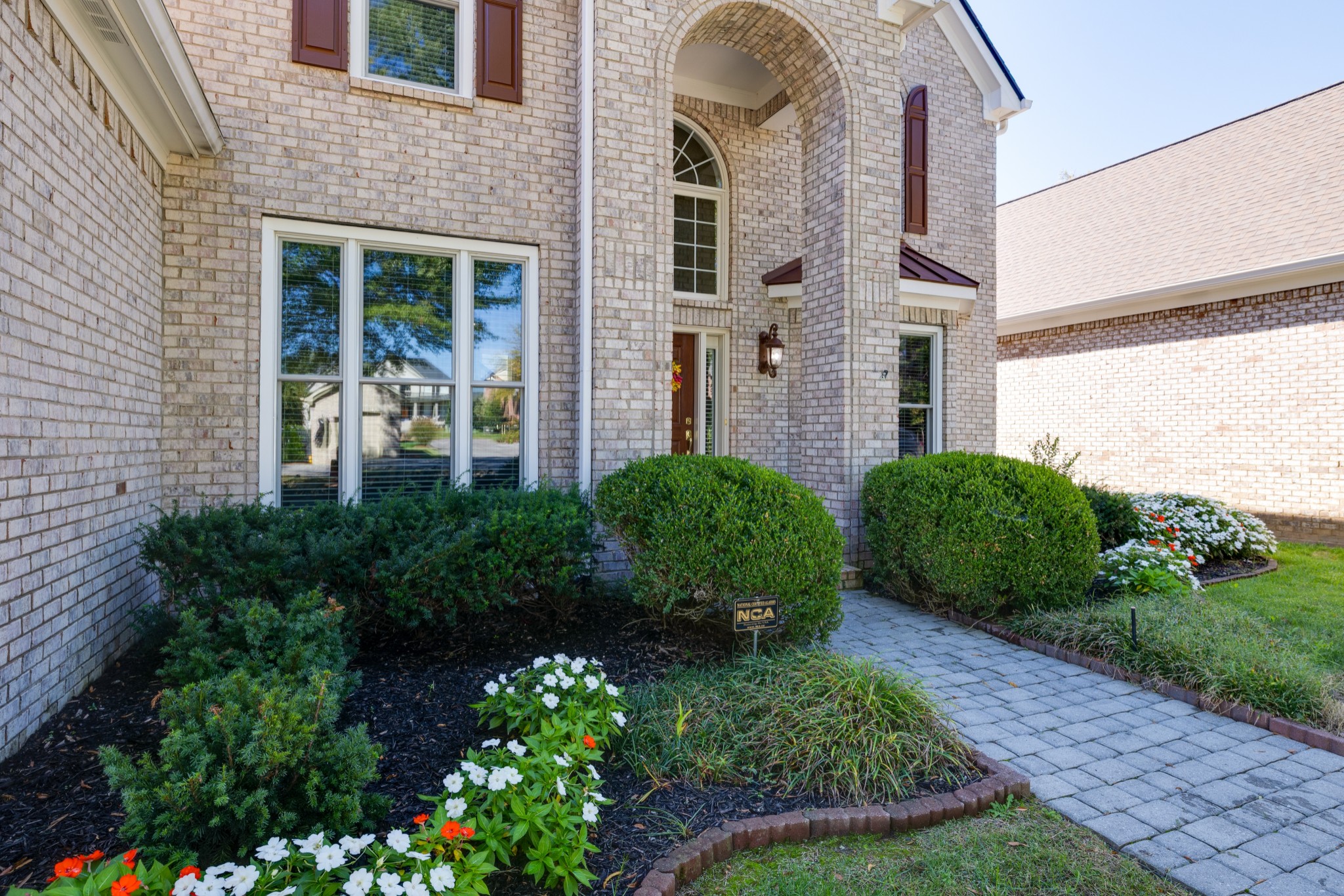 113 Cornerstone Circle Franklin, TN 37064 - Photo 3 of 58 a front view of a house with garden and plants