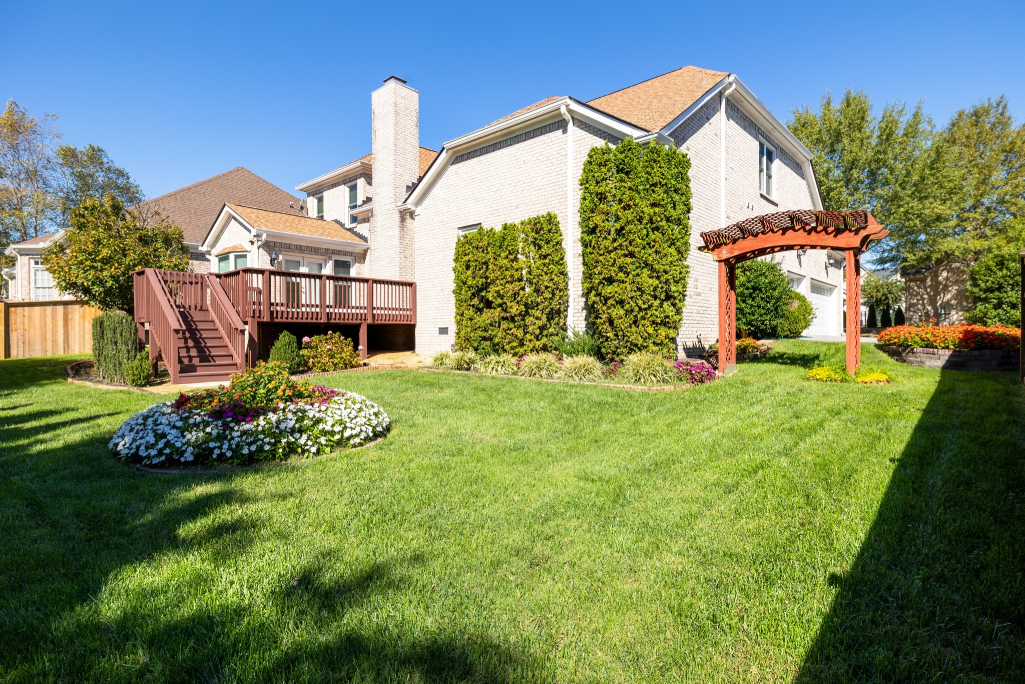 113 Cornerstone Circle Franklin, TN 37064 - Photo 40 of 58 a front view of a house with a yard and potted plants