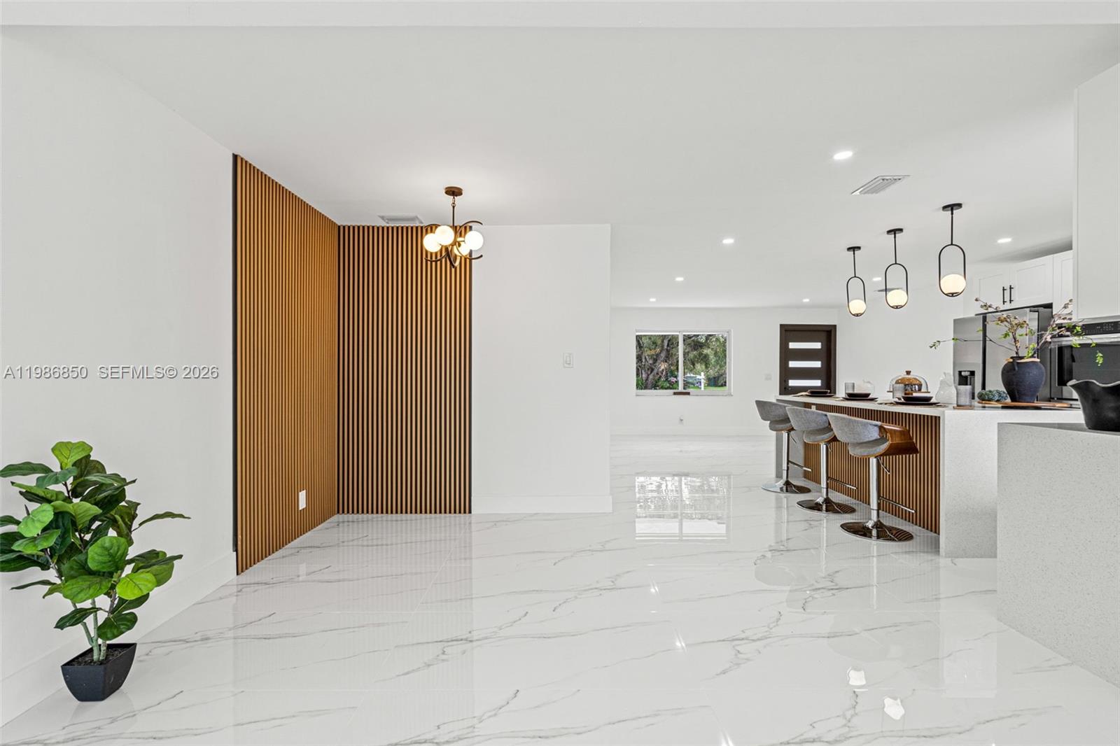 4830 Southwest 188th Avenue Southwest Ranches, FL 33332 - Photo 27 of 58 a view of kitchen with furniture and a potted plant