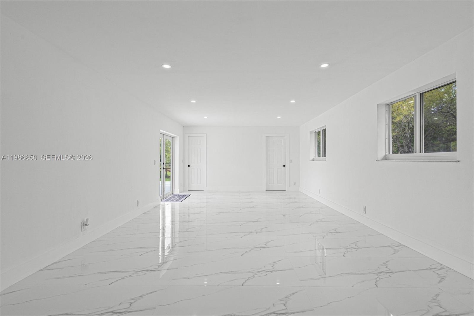 4830 Southwest 188th Avenue Southwest Ranches, FL 33332 - Photo 29 of 58 a view of an empty room with a window