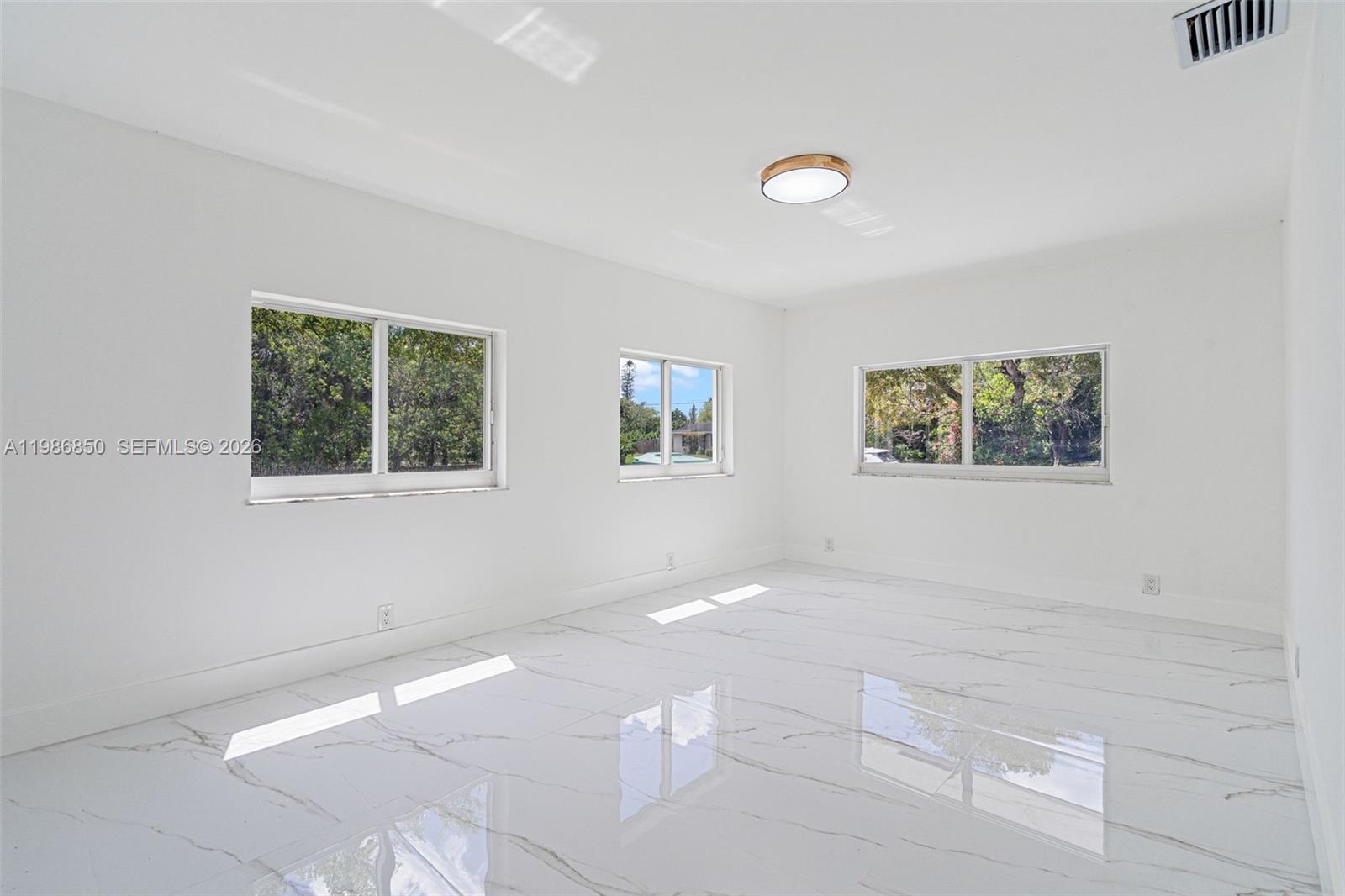 4830 Southwest 188th Avenue Southwest Ranches, FL 33332 - Photo 35 of 58 a view of an empty room with a window