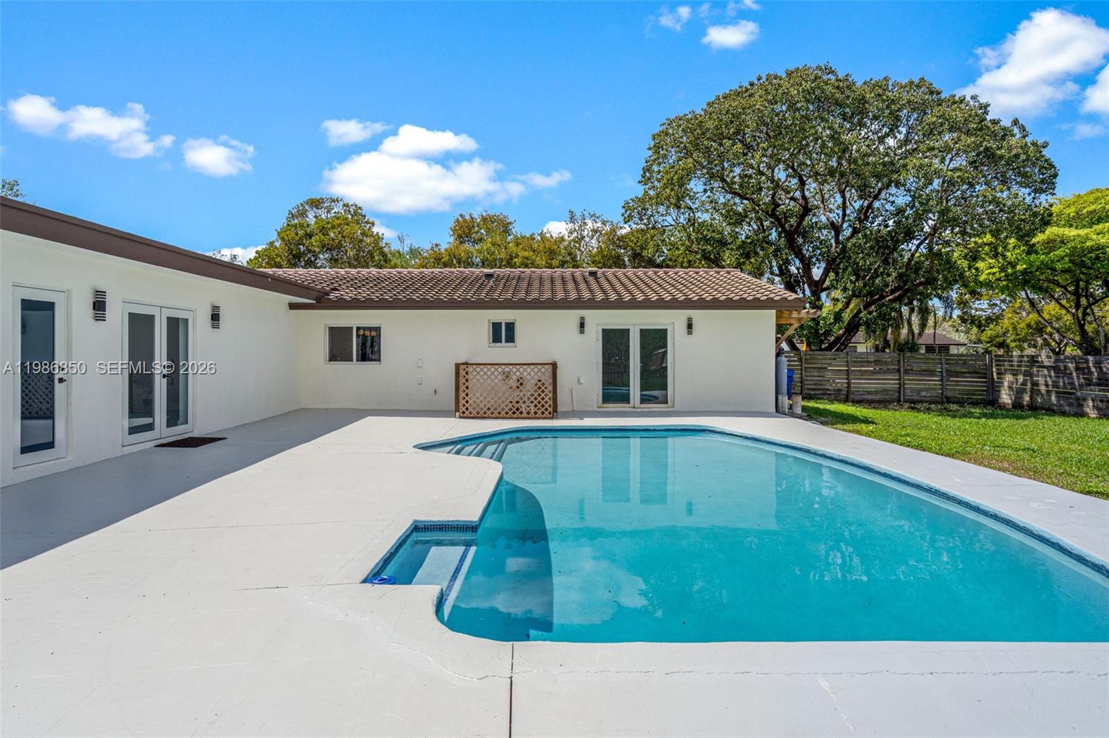 4830 Southwest 188th Avenue Southwest Ranches, FL 33332 - Photo 52 of 58 a house view with a backyard space