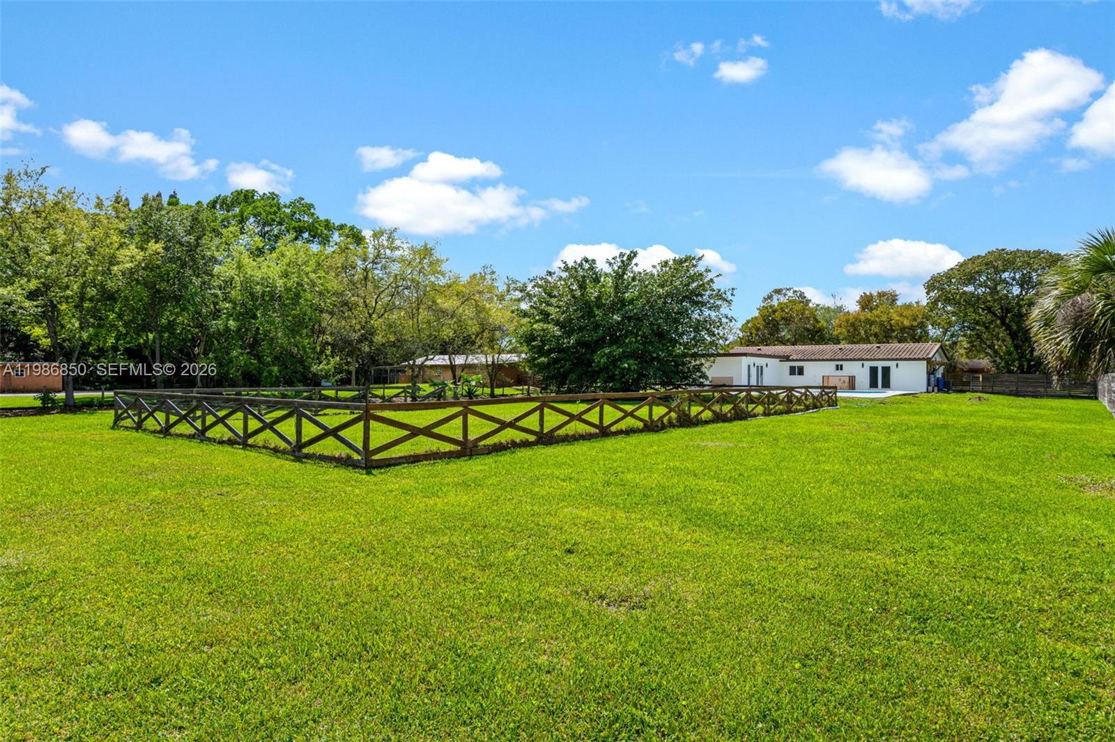 4830 Southwest 188th Avenue Southwest Ranches, FL 33332 - Photo 56 of 58 a view of a golf course with a garden