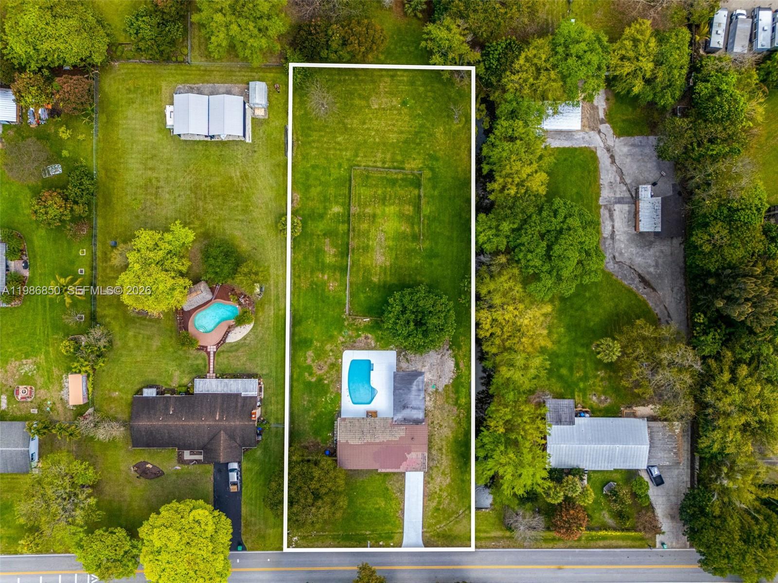4830 Southwest 188th Avenue Southwest Ranches, FL 33332 - Photo 7 of 58 an aerial view of residential houses with outdoor space and street view