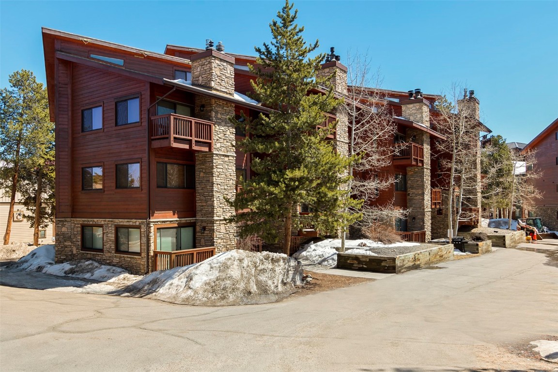 405 4 O Clock Road, Unit 12B Breckenridge, CO 80424 - Photo 19 of 27 a view of a building with a road