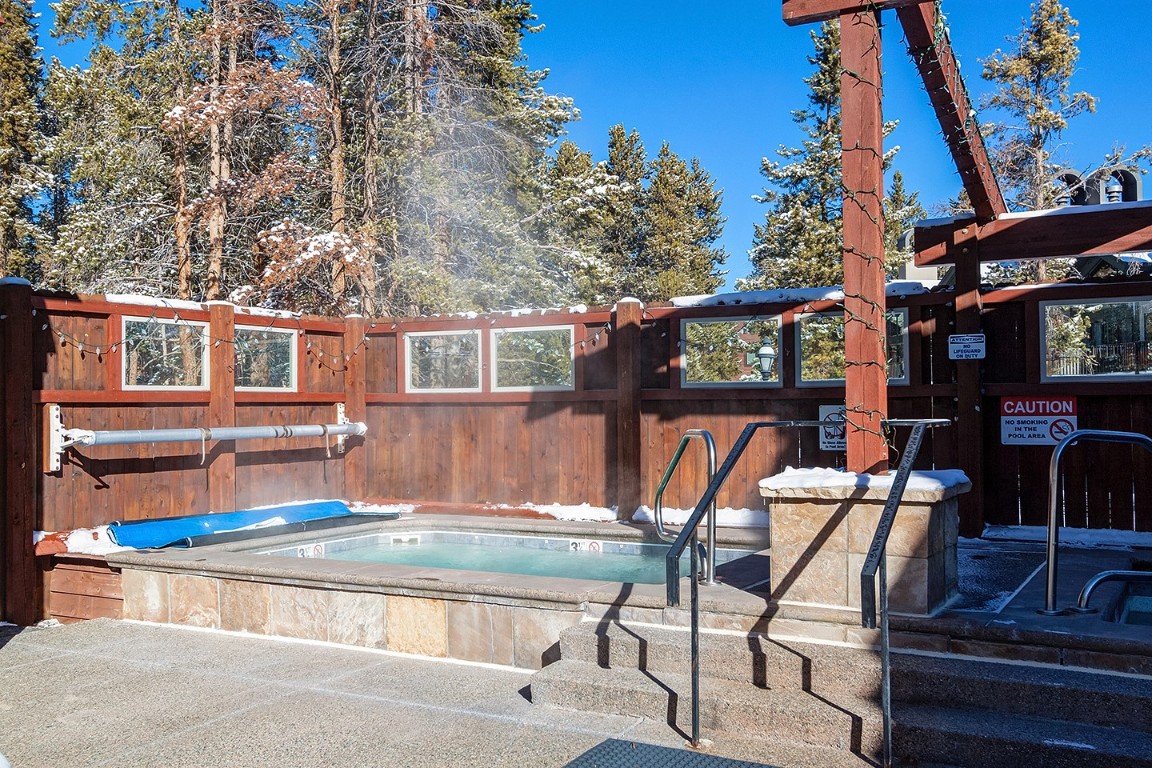 405 4 O Clock Road, Unit 12B Breckenridge, CO 80424 - Photo 25 of 27 a view of a chairs and table in the balcony