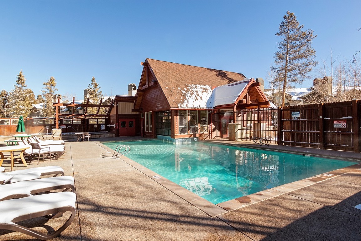 405 4 O Clock Road, Unit 12B Breckenridge, CO 80424 - Photo 26 of 27 a view of a swimming pool with a patio