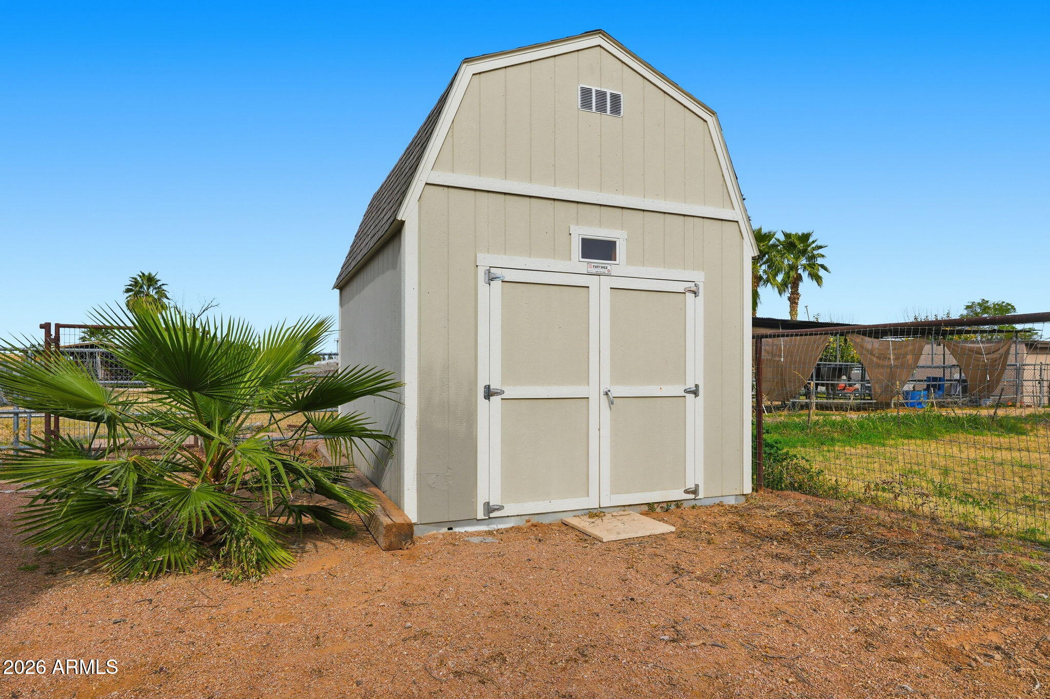 2858 East Redfield Road Gilbert, AZ 85234 - Photo 52 of 60 a view of a house with a yard